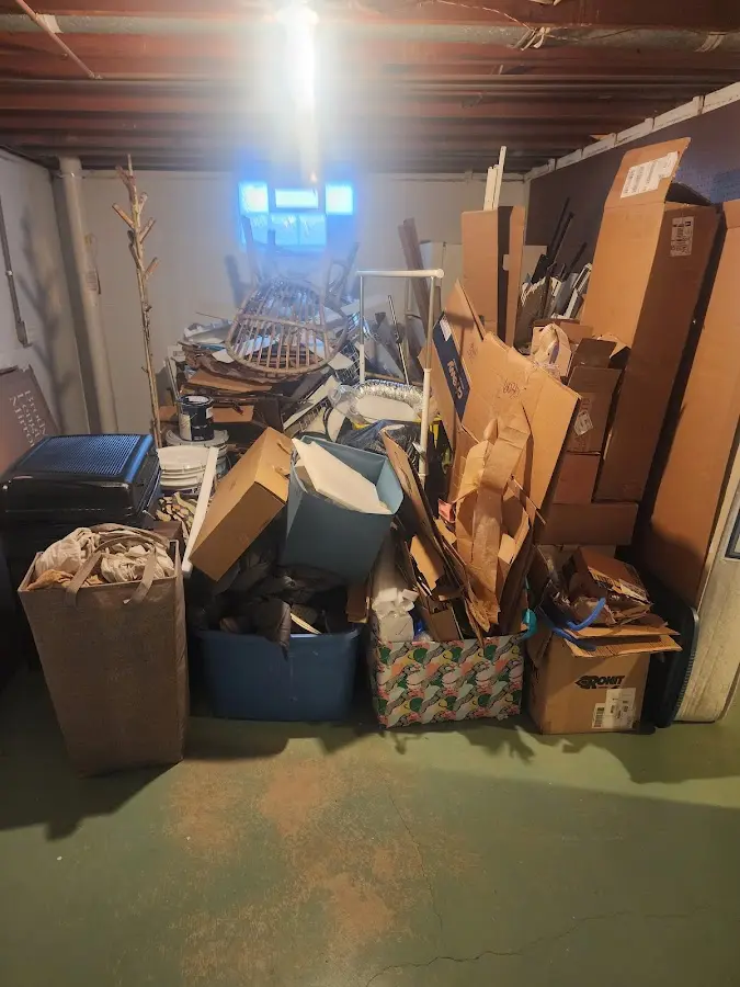 Roll-off dumpster container at job site for 2 Yard Dumpster Rental in Rossford